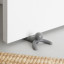 Umbra Buddy Doorstop in use