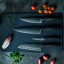Performer range on a chopping board with vegetables. Additional knives sold separately.
