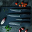 Performer range on a chopping board. Additional knives sold separately