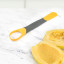 Tovolo Squash Tool in use