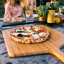 Ooni Bamboo Serving Peel, 30cm with pizza