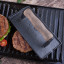 Victoria Matte Black Enamelled Cast Iron Bacon & Meat Press with Wooden Handle in use 