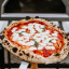 Ooni Ooni Karu Wood & Charcoal Fired Pizza Oven, 40cm in use 