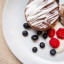 Vista Alegre Karma White Porcelain Dessert Plates, Set of 4 in use 