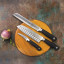 Mercer Culinary Genesis Granton Edge Santoku Knife, 18cm in use 