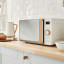 Swan Nordic Microwave Oven, 20L - Cream on counter
