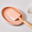 Le Creuset Peche Craft Medium Spatula on the table