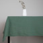 The Collection Stone Washed Cotton Tablecloth - 8-10 Seater - Olive detail on the table