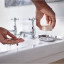 Joseph Joseph EasyStore Luxe Quick Drain Soap Dish in use with someone washing hands