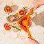 Dreamfarm Orange Fluicer Juicer with pomegranate