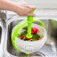 Dreamfarm Spina Salad Spinner & Colander rinsing in the sink