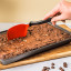Dreamfarm Mini Chopula Spatula - Red cutting the baked brownie
