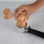 Oh Nice Wooden Coffee Tamper, 51mm - Beech with a portafilter