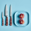 Wusthof Classic Chef's Knife, 20cm - Tasty Sumac on the table with other knives