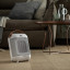 DeLonghi Ceramic Fan 1800W Heater, HFX30C18.AG - HFX30C18 - White in the living room