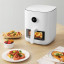 Xiaomi Smart Air Fryer 4L on the table with food
