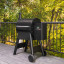 Traeger Pro 575 Wood Pellet Grill next to the balcony rail