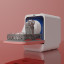 Daan Tech Bob Eco-Compact Dishwasher - Pink Pastel angled with dishes on the table