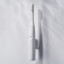 PomaDent PomaClip Magnetic Toothbrush Holder - White on the wall with the toothbrush