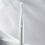 PomaDent PomaBrush Electric Toothbrush Set  - White on the table