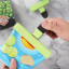 Creative Cooking Mixed Sizes Bag Clips clipping a packet of chips