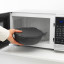 Brabantia Make & Take Salad Bowl, 1.3L - Dark Grey placed in the microwave 