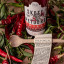 Skote Petoors Delicacies Chilli Crisp Oil With Wooden Spoon, 250ml note with chilli on the table
