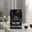 DeLonghi Magnifica Start Bean to Cup Coffee Machine - ECAM220.21.B on a light counter top
