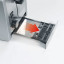 The stainless steel crumb tray features a push function to facilitate their removal and cleaning.
