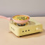Tastelab Mini Cassette Gas Stove - Butter Yellow with a pan of eggs