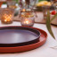Mikasa Lipped Dinner Plates, Set of 4 on the table with a side plate