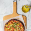 Legend Premium Beechwood Pizza Board on the table with pizza