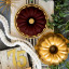 Nordic Ware Anniversary Bundt Pan, 12 Cup on the table with a cake