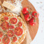 Nordic Ware Hot Air Pizza Crisper, 22cm pizza on the table