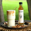 Luckybird African Ginger Syrup - 250ml with a smoothie on the table