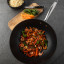 Sagenwolf Titanium Series Non-Stick Wok with Lid, 32cm - Black with prawns on the table