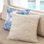Thread Office Bone Striped Space Yarn Woven Scatter Cushion with Feather Blend Inner, 60cm x 60cm on a couch