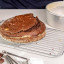 MasterClass Recycled Aluminium Stacking Baking Set, 5-Piece with a cake on a rack