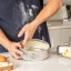 MasterClass Recycled Aluminium Springform Cake Tin, 20cm on the table with baking ingredients