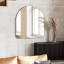 Umbra Hubba Arched Mirror - Metallic Titanium In A Living Room Setting 