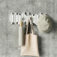 Umbra Sticks Multi Hook - White with an umbrella and a bag