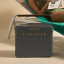 Fieldbar Gin Trunk - Oyster Grey next to outdoor bench 