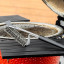 MasterClass BBQ Bristle Spiral Grill Brush on the grill rack
