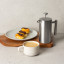 Yuppiechef Stainless Steel French Press - 350ml closed with coffee cup and snacks