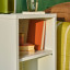 Popstrukt Wafer Side Table - Soft White with decorative books