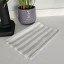 DSA Abigail Mic Tea Towel - Grey on the counter
