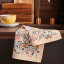 Ulster Weavers Cotton Bee Bloom Tea Towel on the table