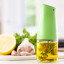 Zuutii Mini Oil Dispenser, 170ml - Fresh Green on the table