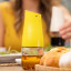 Zuutii Mini Oil Dispenser, 170ml - Light Lemon with oil on the table