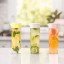 Zuutii Infusion Pitcher, 1.2L - Light Cream on the kitchen counter with other colours